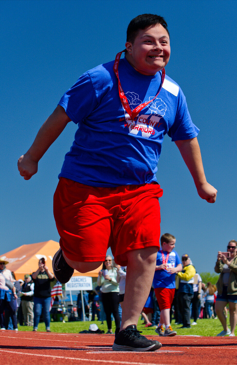 The most compelling part of any race: a strong finish. [see more special olympics success]